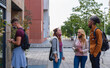© MandriaPix - multi-racial group of university students queuing to present annual enrollment, the new normal life during the epidemic period, prevention from contagion by wearing masks