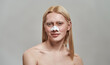 © Svitlana - Groomed young caucasian boy using nose pore strips
