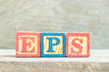 Canvas Print - Color alphabet letter block in word EPS (Abbreviation of Earnings per share) on wood background