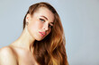 © oleg_ermak - Long healthy straight hair. Beauty woman with long shiny brown hair. Model brunette portrait isolated on a gray background.