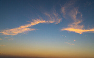 Wall Mural - dusk sky background with colorful sunlight cloud fluffy in the evening on twilight.