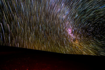Wall Mural - an amazing view of the milky way rising in atacama desert night sky while the moon sets. an awe view