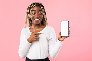 Black lady showing blank empty cellphone screen for mockup