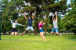 © Spectral-Design - Happy friends jumping in the park