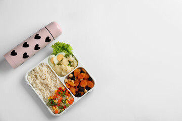 Wall Mural - Thermos and lunch box with food on white background, top view