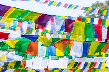 colorful prayer flags. tibetan prayer flags with buddhist scripts.