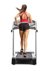 Wall Mural - Full length rear shot of a fit female running on a treadmill