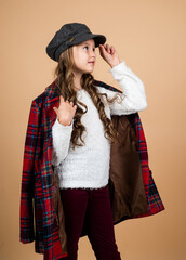 Poster - teenage girl in checkered jacket. happy childhood. beauty and fashion. cheerful parisian child has long hairstyle. stylish kid wear trendy french cap. seasonal autumn fashion look