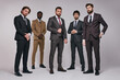 © Roman - bearded brutal guys in classic suits posing with serious facial expression, young men in tux looking at camera, smart and intelligent. portrait