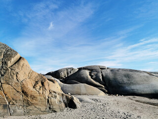 Poster - Closeup shot of a seashore with big cracked rocks in Ula, Norway