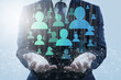 © tadamichi - Digital marketing and customers on internet. Business person holding network structure and customer icons.