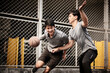 © imtmphoto - two young asian men playing basketball outdoors