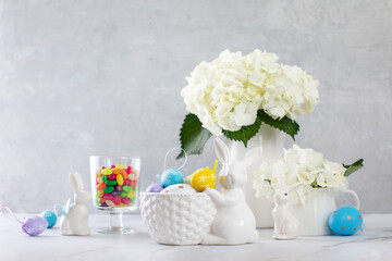 Wall Mural - Easter home decorations setting with fresh flowers and eggs