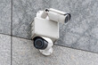Security cameras on modern building. Professional surveillance camera. CCTV on the wall with LED IR lights. Security system, technology concept. Video equipment for safety system area control outdoor.