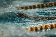 Swimming backstroke sportsman with splashes