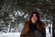 © Provokator - Girl in the winter, against the background of snow-covered trees