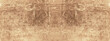 © Corri Seizinger - Old brown beige vintage worn shabby patchwork motif tiles stone concrete cement wall texture background banner