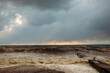 © MadCat13Shoombrat - Storm waves near the shore on the beach. In the foreground, breakwaters.