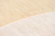 © Augustas Cetkauskas - Wooden floor volleyball, basketball, badminton, futsal, handball court with light effect Wooden floor of sports hall with marking lines line on wooden floor indoor, gym court