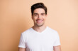 © deagreez - Photo of happy charismatic young man beaming smile good mood isolated on pastel beige color background