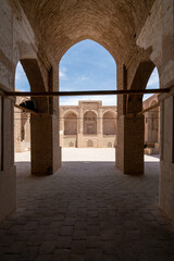 Wall Mural - Yazd, Iran - 13.04.2019: Courtyard of the historical Jameh Mosque of Naein, Yazd province, Iran. Very old islamic architecture.