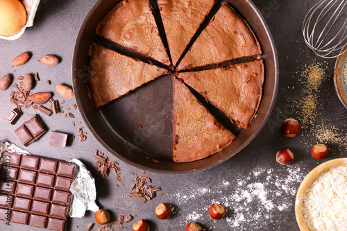 chocolate cake sliced and ingredients © M.studio