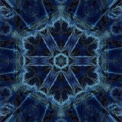 hexagonal patterns and floral fantasy designs in shades of blue on a black background