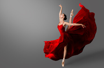 Ballerina Dance. Ballet Dancer in Red Dress jumping Spit. Woman in Ballerina Shoes dancing in Evening Silk Gown flying on Wind