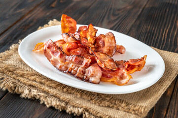 Wall Mural - Fried bacon on the serving plate