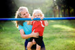 mom with a child in the park on a sports equipment, fitness, healthy lifestyle.