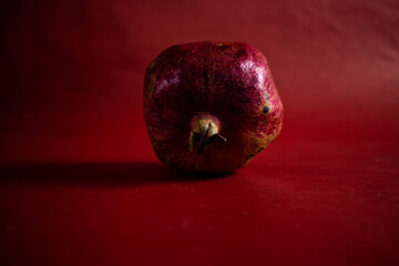 red apple on black background