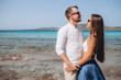 © Oleksandr - Happy Couple hugging at the sea beach, adult, summer holidays