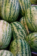 Vertical Closeup Shot Of Watermelons At A Market