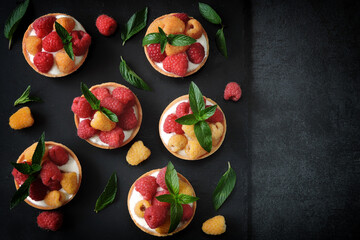 Wall Mural - Raspberry tarts with white yogurt and fresh raspberries. Healthy dessert. Keto dessert.