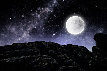 Wall Mural - bright full moon over dark mountain