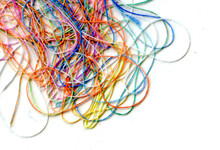 Multicolor Tangled Color Needlecraft Silk Cord. Abstract Color Background, In White Background	