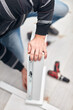© astrosystem - Handyman worker assembling furniture and fixing it.