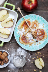 Wall Mural - Traditional apple fritters on the plate.