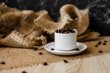 Coffee beans in a cup