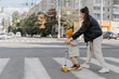 © Ananass - happy cute little kid girl cross the road with mother