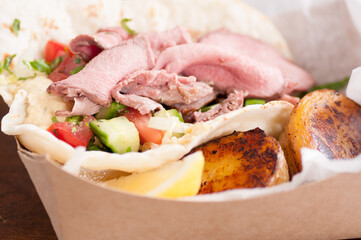 Canvas Print - lamb shawarma take out meal in a box