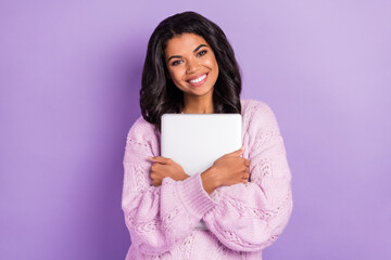 Poster - Photo of young beautiful charming positive smiling afro girl hug embrace laptop isolated on purple color background