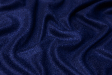 Wall Mural - .Blue dark monochrome artificial wool. Close up texture of the fabric is useful as a background.