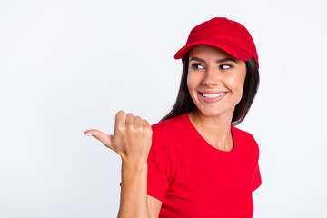 Sticker - Photo of young happy cheerful lovely charming service girl point finger copyspace promo isolated on grey color background