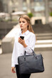 © Bogdan - Beautiful business lady  going to work white shirt black pants holding suitcase  and phone on the street, Briefcase Designer Leather Laptop Satchel Portfolio Messenger Bag.