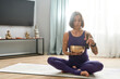 © Svitlana - Young girl meditates with sound bowl at home