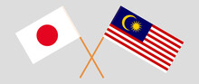 Crossed Flags Of Japan And Malaysia. Official Colors. Correct Proportion