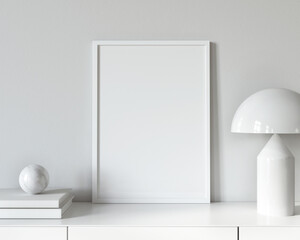 Wall Mural - White frame mockup on the chest of drawers near table lamp, b…