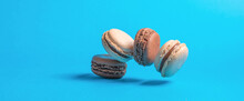 Macarons On Blue And Yellow Background