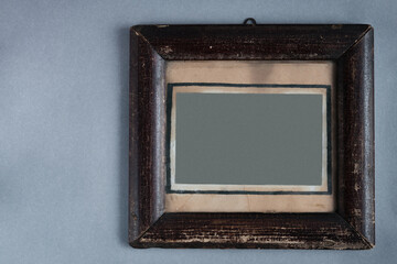 Old vintage antique photo frame on gray background